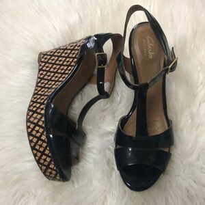 Clarks Black Patent Leather T‑Strap Wedge Sandals with Patterned Tan Platform